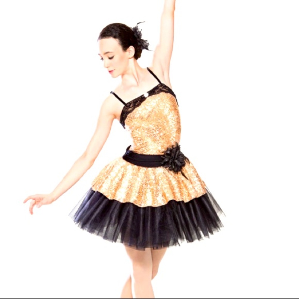 Revolution dance costume.  Gold black sequence